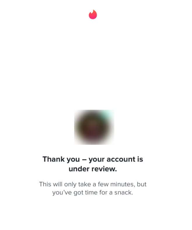 why is my tinder account under review message